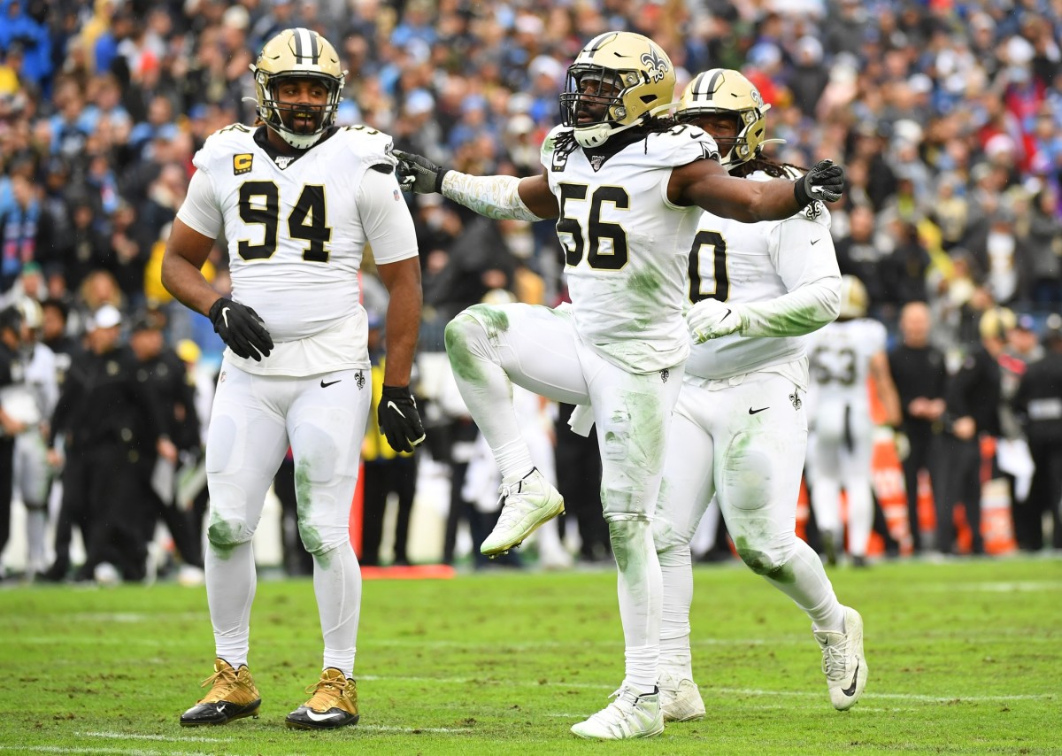 Saints defensive end Cameron Jordan (94) and linebacker Demario Davis (56) celebrate after a sack. Mandatory Credit: Christopher Hanewinckel-USA TODAY Sports